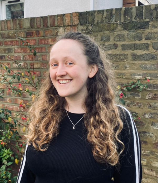 A photo of Samantha Hodder facing the camera and smiling.